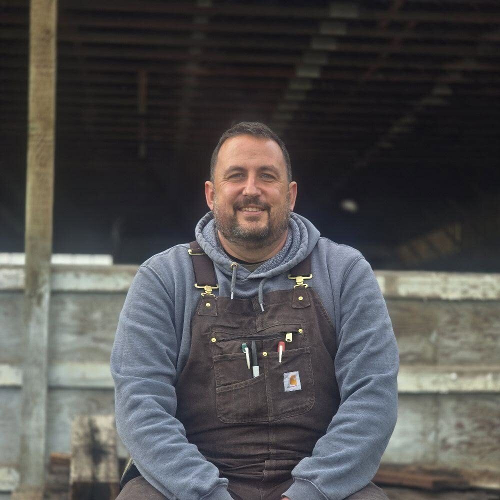 headshot of brandon roman owner